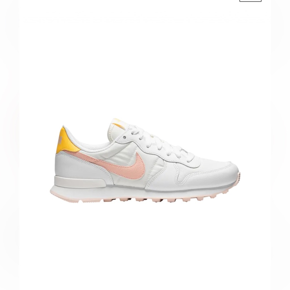 Nike Woman’s Internationalist White and Arctic Orange Sneakers